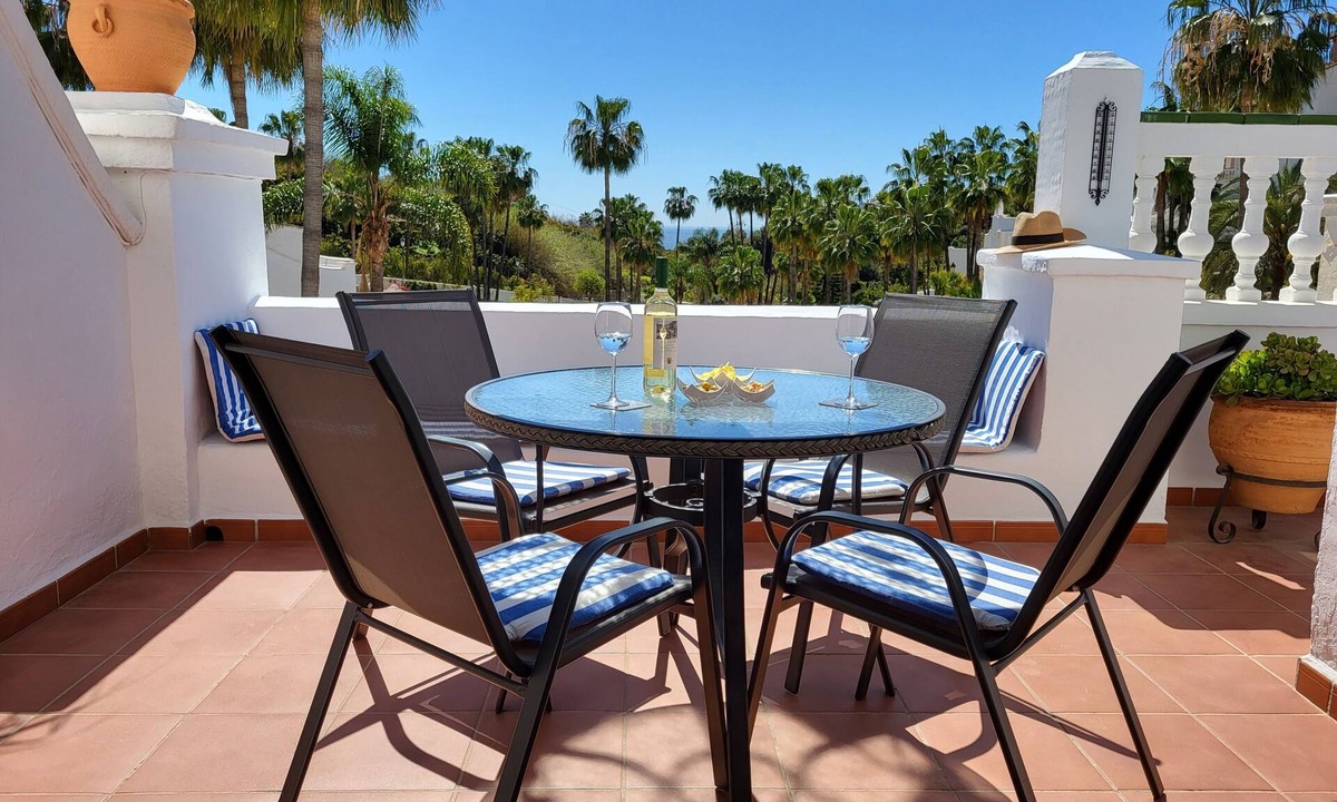 Oasis del Capistrano Apartment | Relax.south facing terrace, all day sun, views of tropical gardens and pools