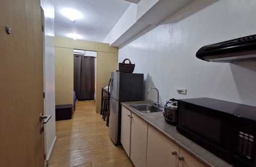 Ususan Condo | 1BR Studio w/Pool, Balcony, Close to Airport, BGC and Sm Aura.