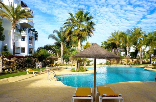 New Golden Mile Apartment | 2 Bedroom Beachside Apartment Overlooking Pool & Palm Trees On New Golden Mile