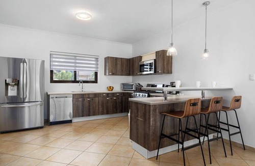 Gold Coast Villa | 4BR Villa @ Gold Coast w/Pool + Gym & TennisCourt
