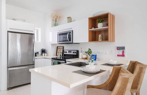 Turibana Condo | Beach Tennis Court And Resort Pool