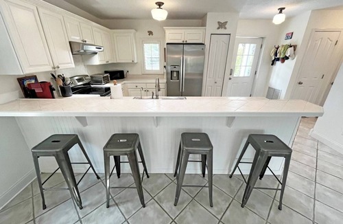 St. Augustine Beach House | Beautiful, well-appointed three-bedroom beach house 300 yards from the beach.