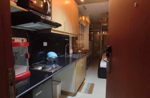 Paranaque Condo | Charming 2-bedroom condo with Cinema Room, AC, WiFi in wonderful SM Mall of Asia