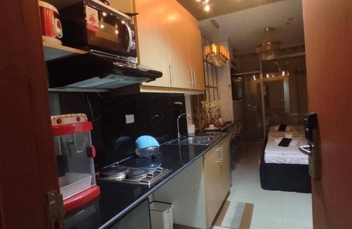 Paranaque Condo | Charming 2-bedroom condo with Cinema Room, AC, WiFi in wonderful SM Mall of Asia