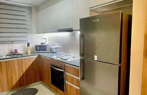Lapu-Lapu Condo | Condo by the Beach OMP Mactan Int'l Airport, 2 bedrooms/2 baths sleeps 7 guests