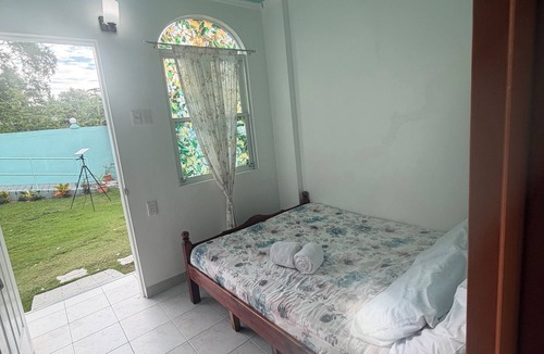 San Remigio Bed & Breakfast | Couples Getaway with A.C./WiFi/Karaoke and complimentary water & coffee