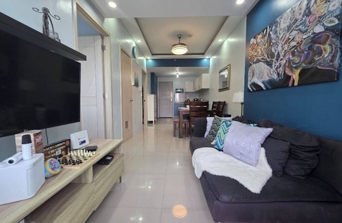Santo Cristo Condo | Cozy 2-bedroom condo w/AC living room, balcony, Netflix walking dis to SM North