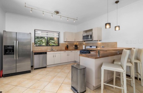 Gold Coast Villa | Exquisite Poolside Living with 3BR & 2BA at Diamante 165 by Bocobay