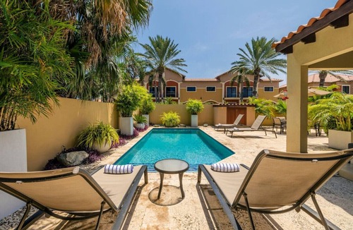 Gold Coast Villa | Exquisite Poolside Living with 3BR & 2BA at Diamante 165 by Bocobay