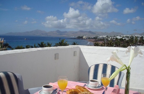 Puerto del Carmen Apartment | Holiday Apartment 'El Quintero' with Sea and Mountain Views, Balcony & Wi-Fi