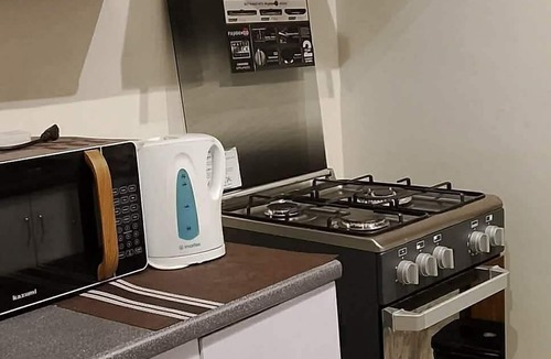 Bagumbayan Apartment | Ideal Family Getaway Connected to Eastwood Mall