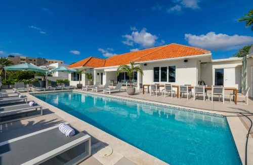Oranjestad Villa | LUX 10BR 10BA Pool Beach Front Villa Playa by Bocobay