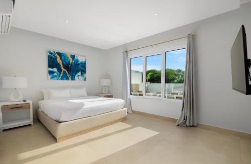 Oranjestad Villa | LUX 10BR 10BA Pool Beach Front Villa Playa by Bocobay