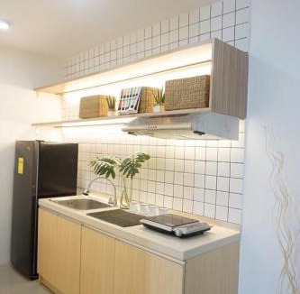 Kaunlaran Apartment | Modern Tropical Home In The Heart of Quezon City