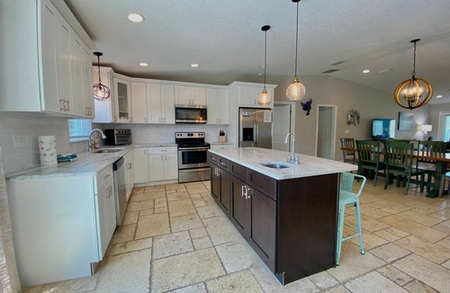 Butler Beach House | Mystical - Relaxing Heated Pool and Stylish Comfortable Home, Pet Friendly!