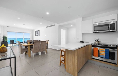 Rancho Apartment | Ocean View Luxury Condo in Downtown Aruba Harbour House Large Wraparound Balcony