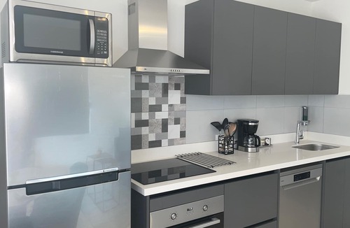 Oranjestad Condo | Oceanfront 1BDRCondo: 2x Queen-Beds|Pool|Full-Kitchen|SofaBed|Mini-Beach|Dock