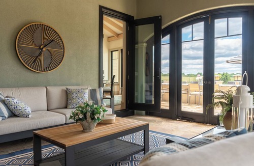 Wernersville House | Overlook Retreat Villa is a luxury private estate on 100 scenic acres for up to 18 guests. Enjoy a pool, hot tub, game room, sports court, and sweeping sunset views that make you stop mid-sentence and create lasting memories!