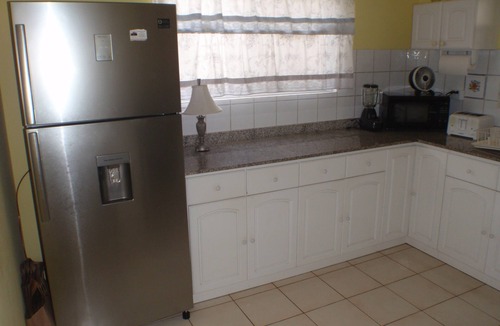 Kamay House | Pool, 2 full Kitchens 3 kings, 1 Queen, 5 twin beds.Close to Palm Beach plaza.