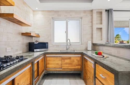 Ponton Apartment | Spacious 2BR Aruba Home with a Pool, BBQ, Full Equipped Kitchen & Gated Backyard