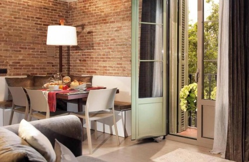 El Raval Apartment | Stunning Light-Filled Apartment with Rooftop Pool in Central Barcelona