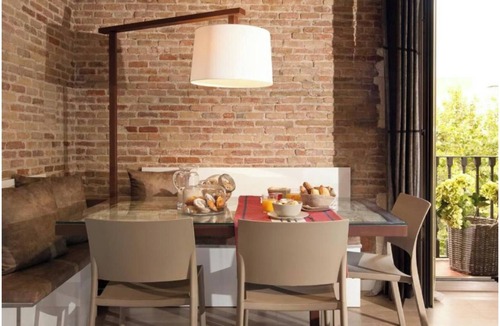 El Raval Apartment | Stunning Light-Filled Apartment with Rooftop Pool in Central Barcelona