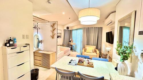 Maribago Apartment | TDJ Japandi Room with Residential Pool access in Tambuli Seaside Mactan