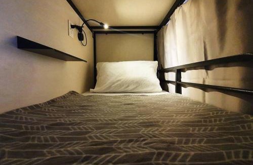 Bel-Air Apartment | Travelers Inn - Cozy Capsule Bunks, Makati