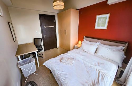 Bonifacio Global City Apartment | Travellers Haven 3br BGC, Bathtub, XBOX, 200mbps