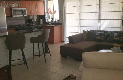 Turibana House | Tropical Bohemian style townhouse 5 mins to Palm Beach, Restaurants & Nightlife.