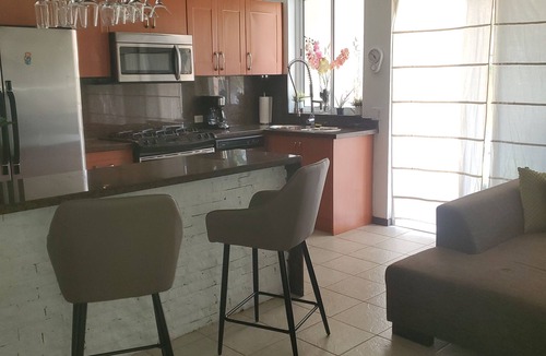 Turibana House | Tropical Bohemian style townhouse 5 mins to Palm Beach, Restaurants & Nightlife.