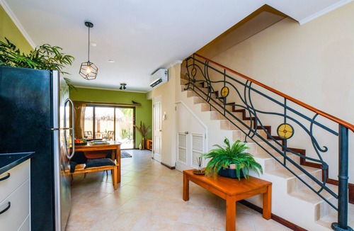 Gold Coast House | Tropical-inspired Condo, 3 min. drive to beach!