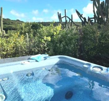 Savaneta Apartment | Very quiet apartment with lots of privacy and a tub on the edge of a national park!