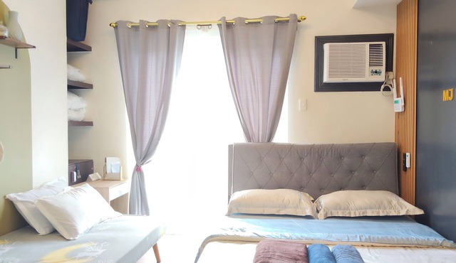 10-mins walk from airport-Furnished 1BR condo