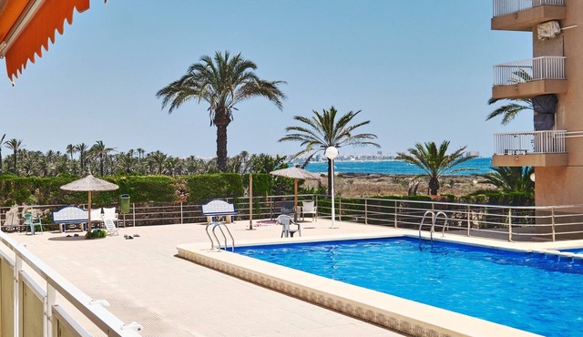 Apartment with 2 bedrooms, Wi-Fi, air conditioning, sea view, pool, and garage