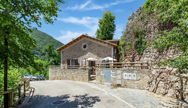 Appealing holiday home in Ogassa with patio