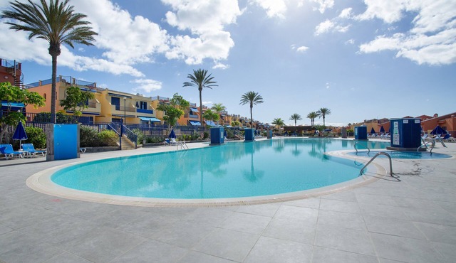 Bahia Meloneras Luxury Duplex: Sea Views, Shared Terrace & Air Conditioning