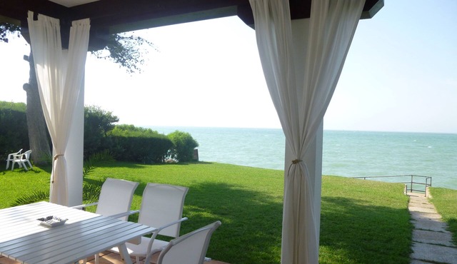 Beach line villa with stunning sea views. WIFI. Private garden
