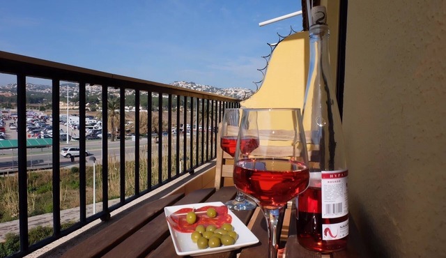Bright, spacious apartment in Moraira town with vineyard and mountain views,
