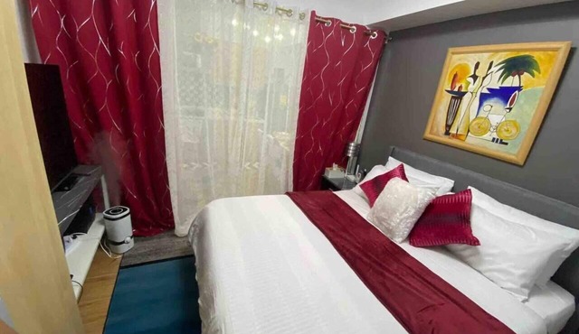 Cozy 1BR cityview with Balcony and near Airport