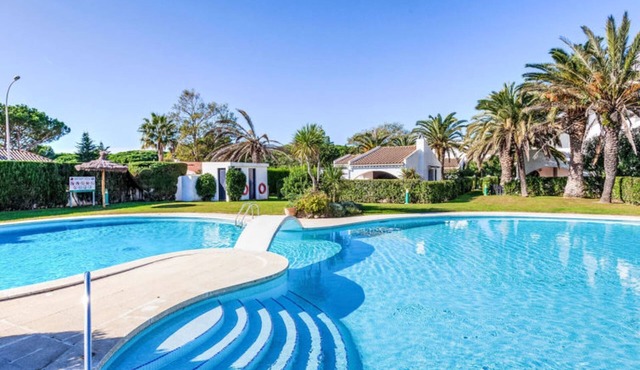 Green garden & house Pals Beach by Interhome