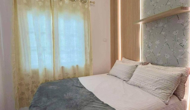 Newly Furnished, Modern 3-bedroom house with AC in lovely Dauis beach.