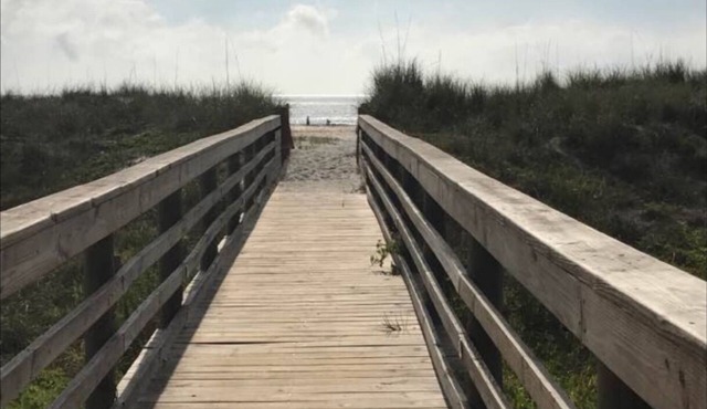 St. Augustine Beach condo, no roads to cross, just direct access to sun & surf.