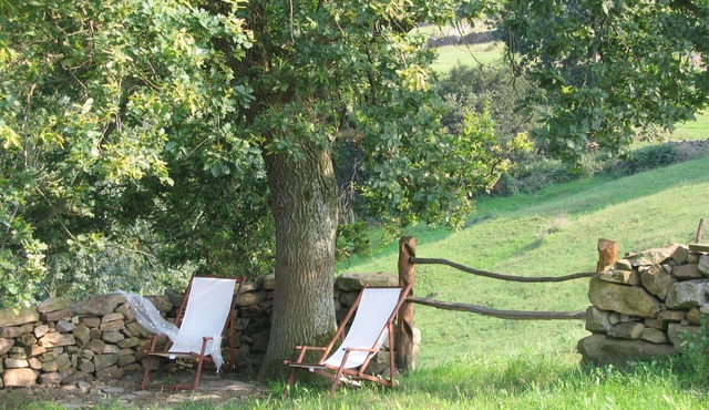 Typical dwelling of the valley of the Pas located in a farm of green pastures