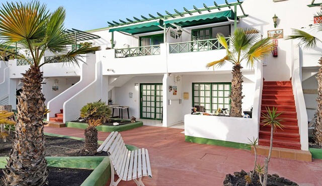 Vacation Apartment 'Los Pocillos' with Mountain View, Shared Pool and Wi-Fi