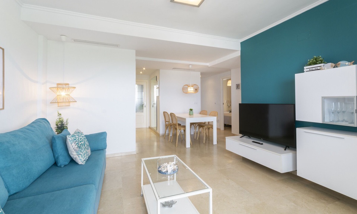 Playa de Gandia Apartment | Decorated in modern style, with wifi free, International channels, BBQ, children's area, - only families