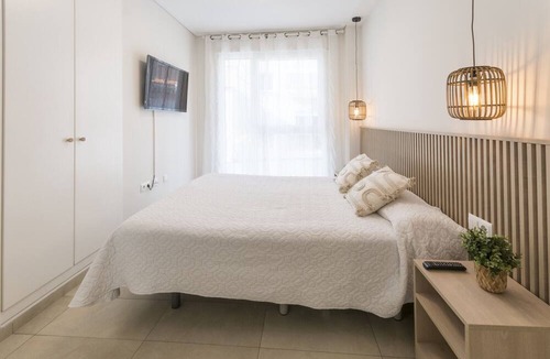 Grao de Gandia Apartment | Beautiful property with 2 bedrooms. Wifi - only families