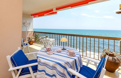Sant Andreu de Llavaneres Apartment | Lovely apartment for 6 guests with pool, WIFI, TV and balcony
